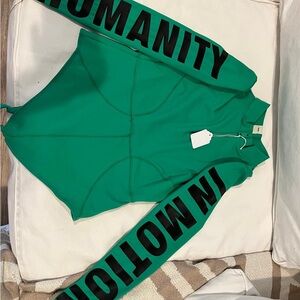 Green Long Sleeve Top with Black Lettering